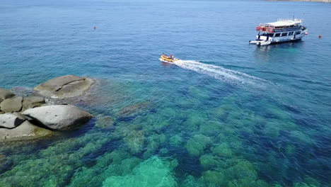 travel, aerial and people in speed boat in ocean