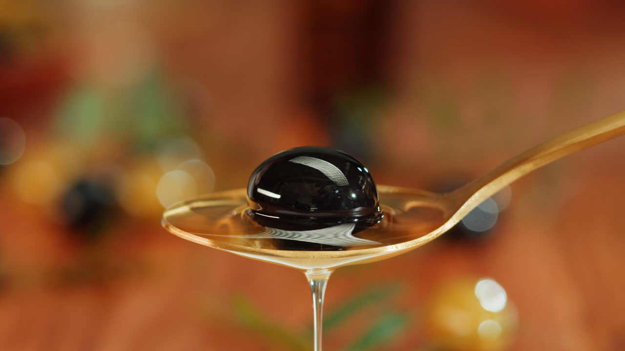 Black Olive on Spoon