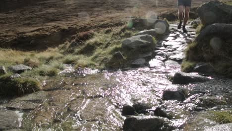 mountain marathon runners on a cold and rainy day competing in a race in winter