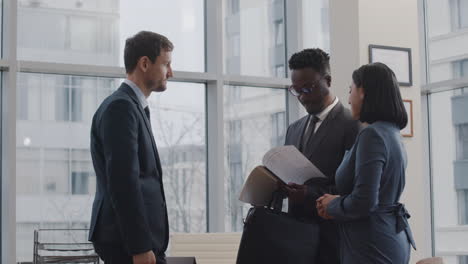 lawyers talking with client in the office