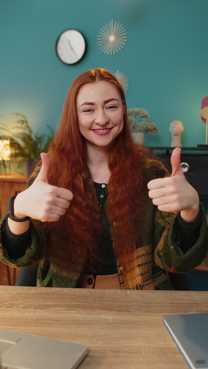 Smiling businesswoman showing thumbs up sign positive something good great news positive feedback