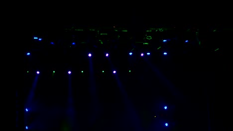flashing concert light in an empty theater.