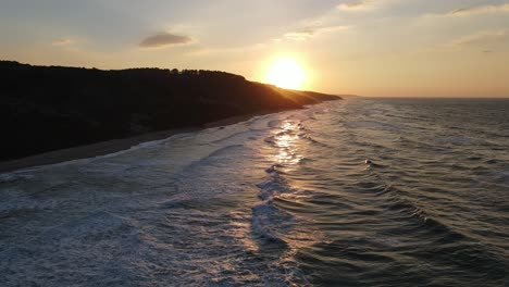 sunset sea waves