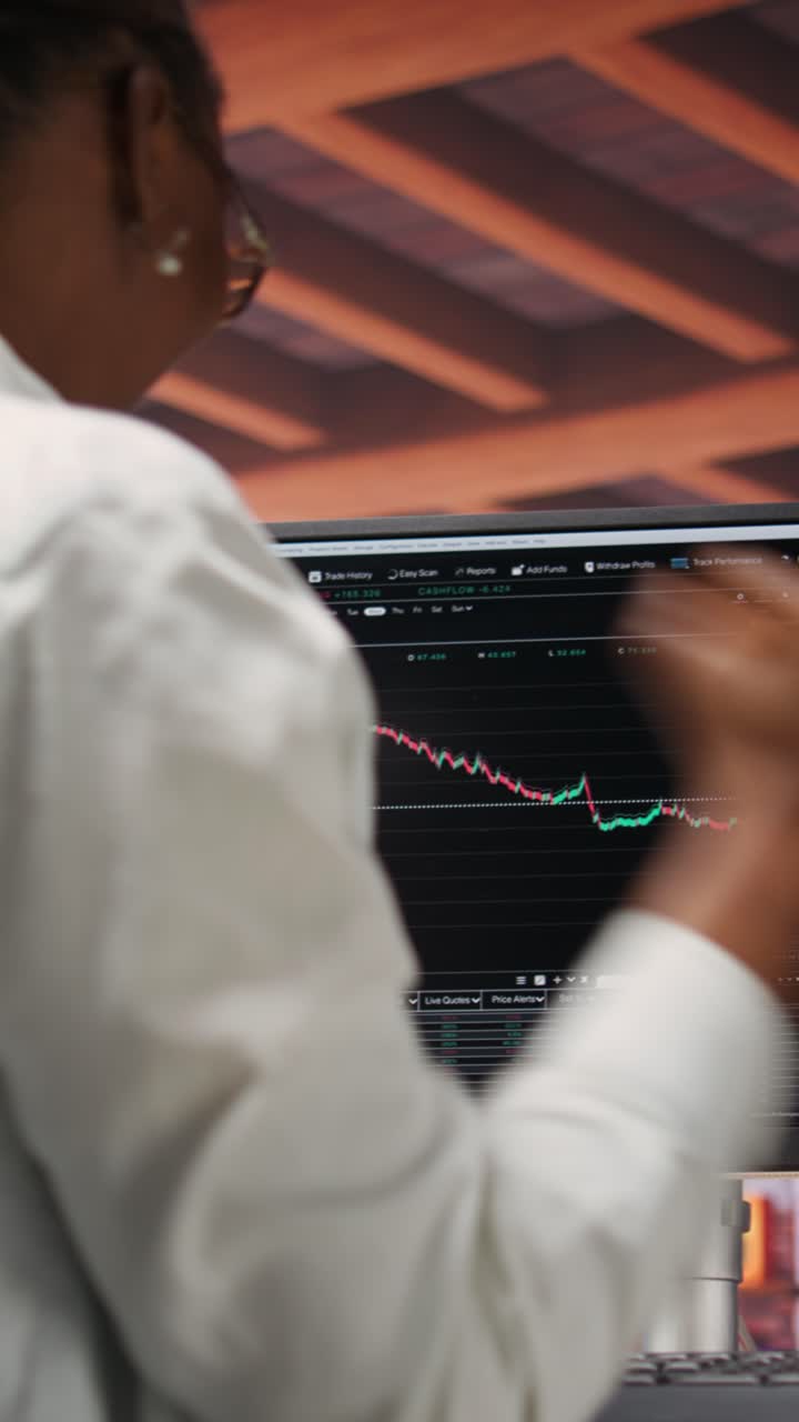 Vertical video Happy day trader using PC, satisfied after purchasing well performing stocks