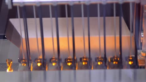 Close-up-view-of-of-medical-vials-sealing-with-fire