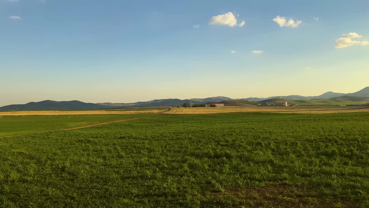 railway road trip travel and landscape of nature green fields vivid colorful spring in Iran skyline agriculture Alberta Canada country cowboy farming hay mountains rural scenery western harvest season