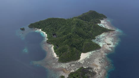 high altitude shot of stunning keruo island in raja ampat indonesia