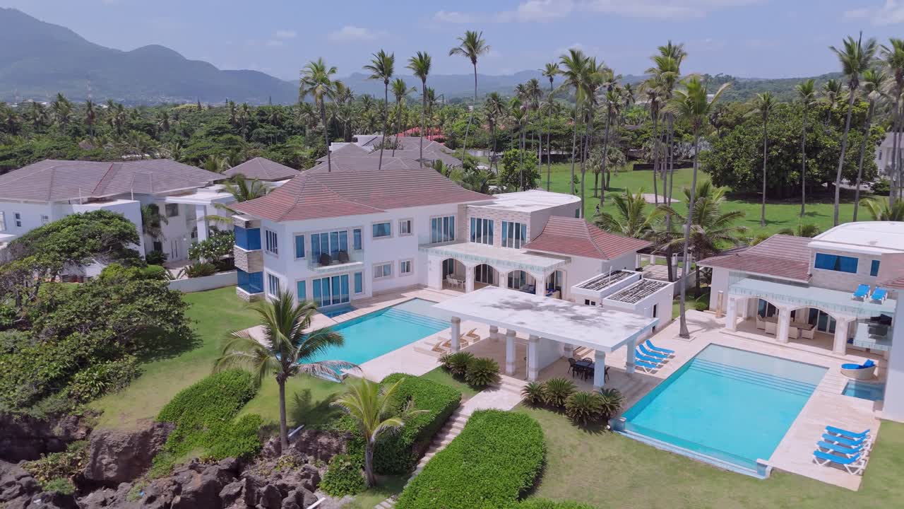 Aerial view of swimming pool in front of luxury villa apartment in Puerto Plata. PENISULA ESMERALDA, Dominican Republic.