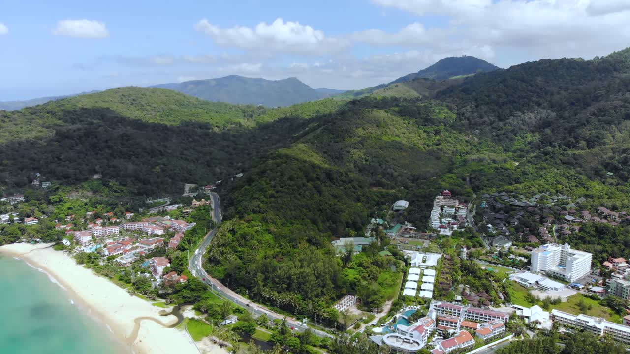 Aerial View Of Beach With Forested Landscape In The Background In Phuket