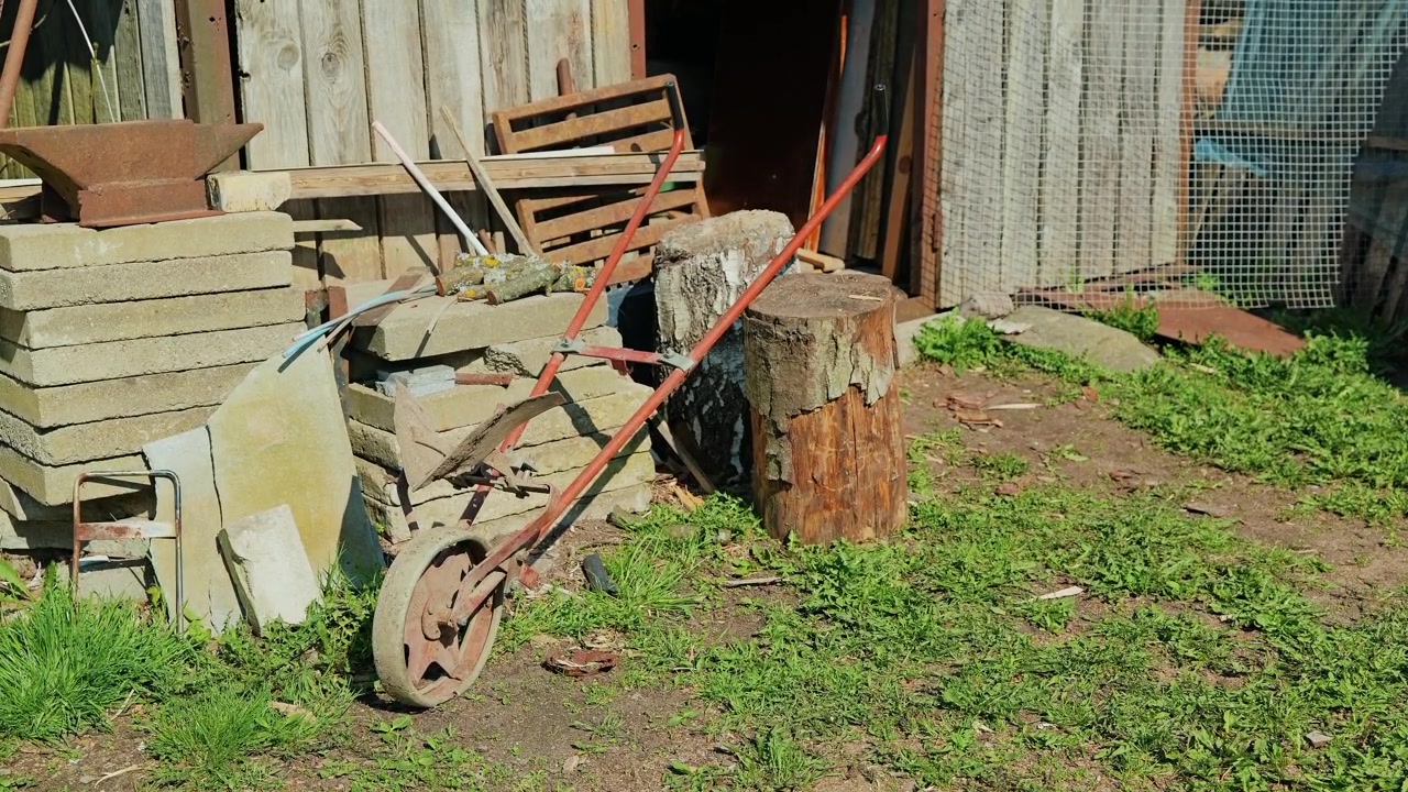 Historic farming implements and weathered materials reflect rural heritage
