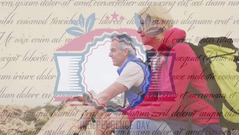 Animation-of-independence-day-text-over-smiling-senior-caucasian-couple-sitting-on-rocks