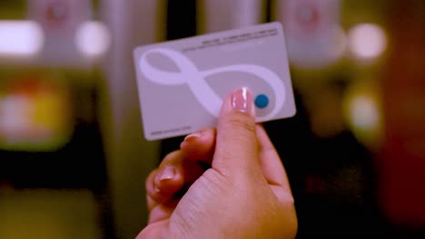 hand holding octopus card in hong kong