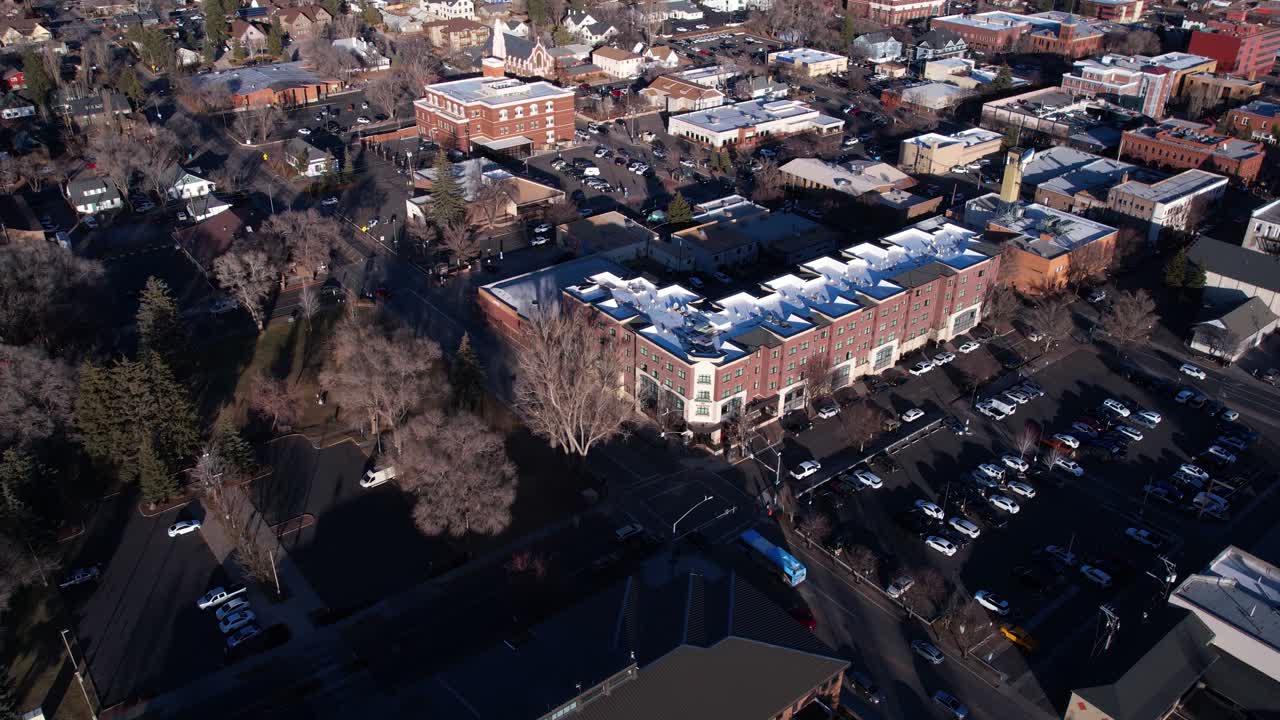 Aerial View of Downtown Flagstaff AZ US on Sunny Winter Day, Street Traffic and Buildings