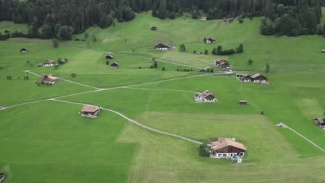 drone camera going to the front side where low rise buildings are located ariel view lauperswil