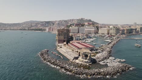 famous historic seafront egg castle in bay of naples, italy