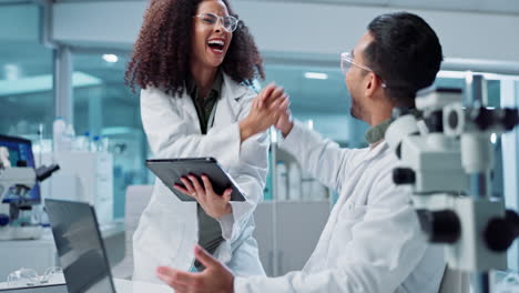 scientists collaborating in a modern laboratory
