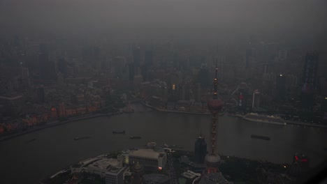 aerial view of shanghai skyline with oriental pearl tv tower and huangpu river