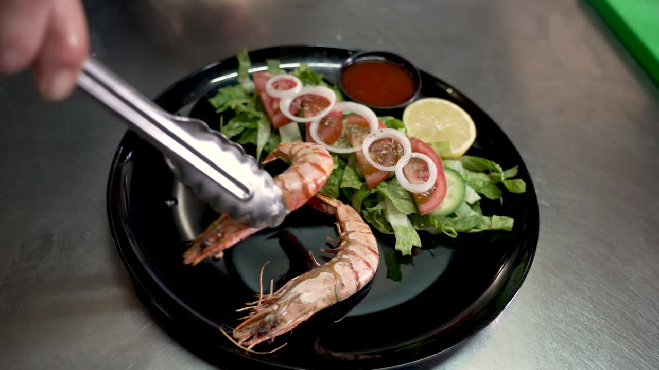 Fresh seafood preparation at a bustling kitchen with vibrant ingredients and expert hands
