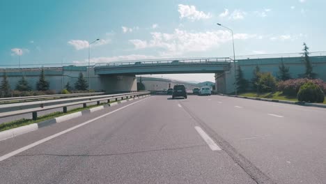 highway underpass driving scene