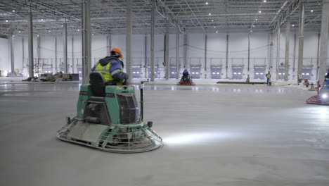 concrete floor pouring in a large warehouse