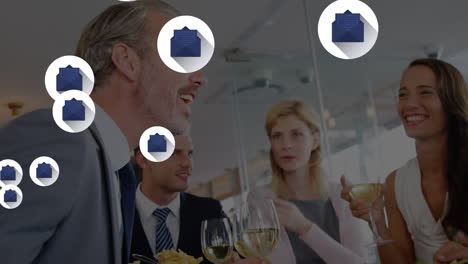 animation of message icons floating over group of diverse businesspeople enjoying drinks at office