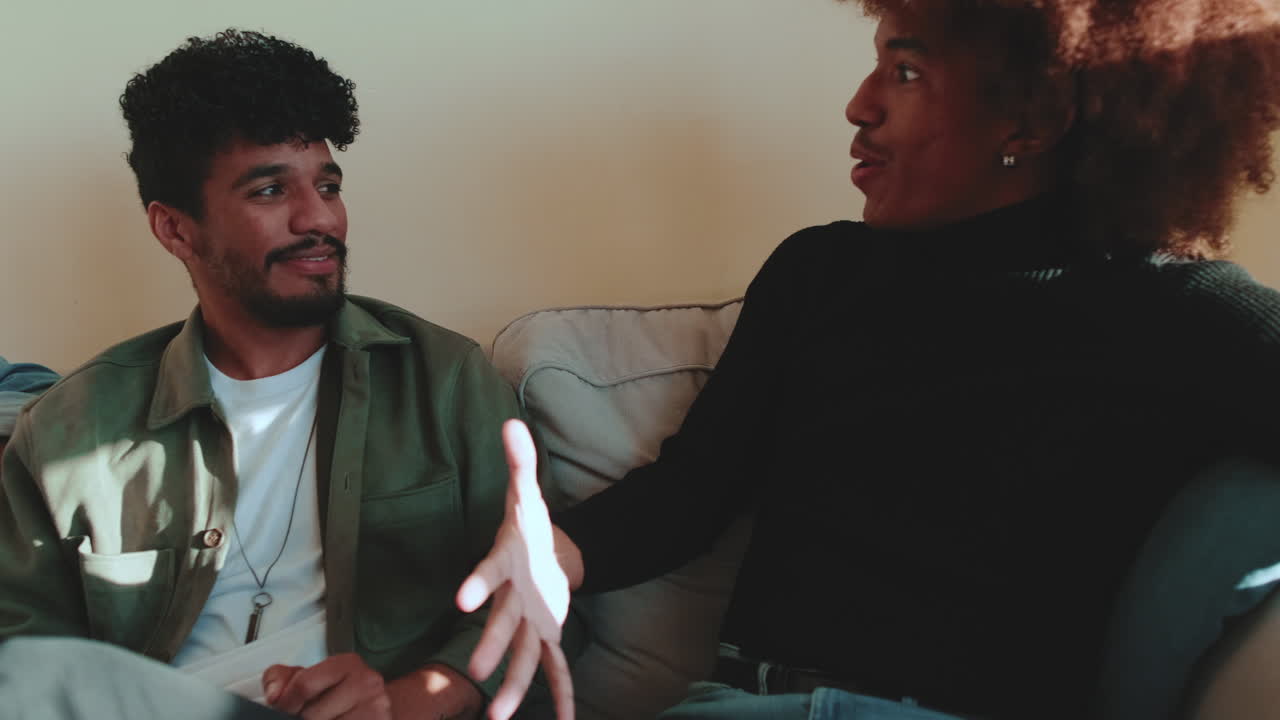 Two Men Engaging in a Friendly Conversation