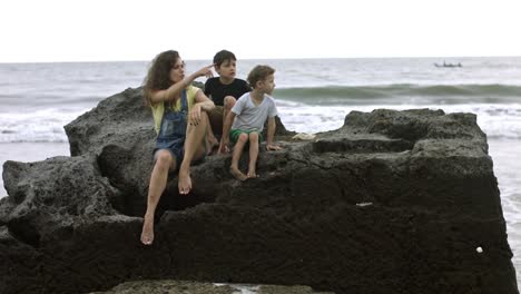 brothers spending time together with mother