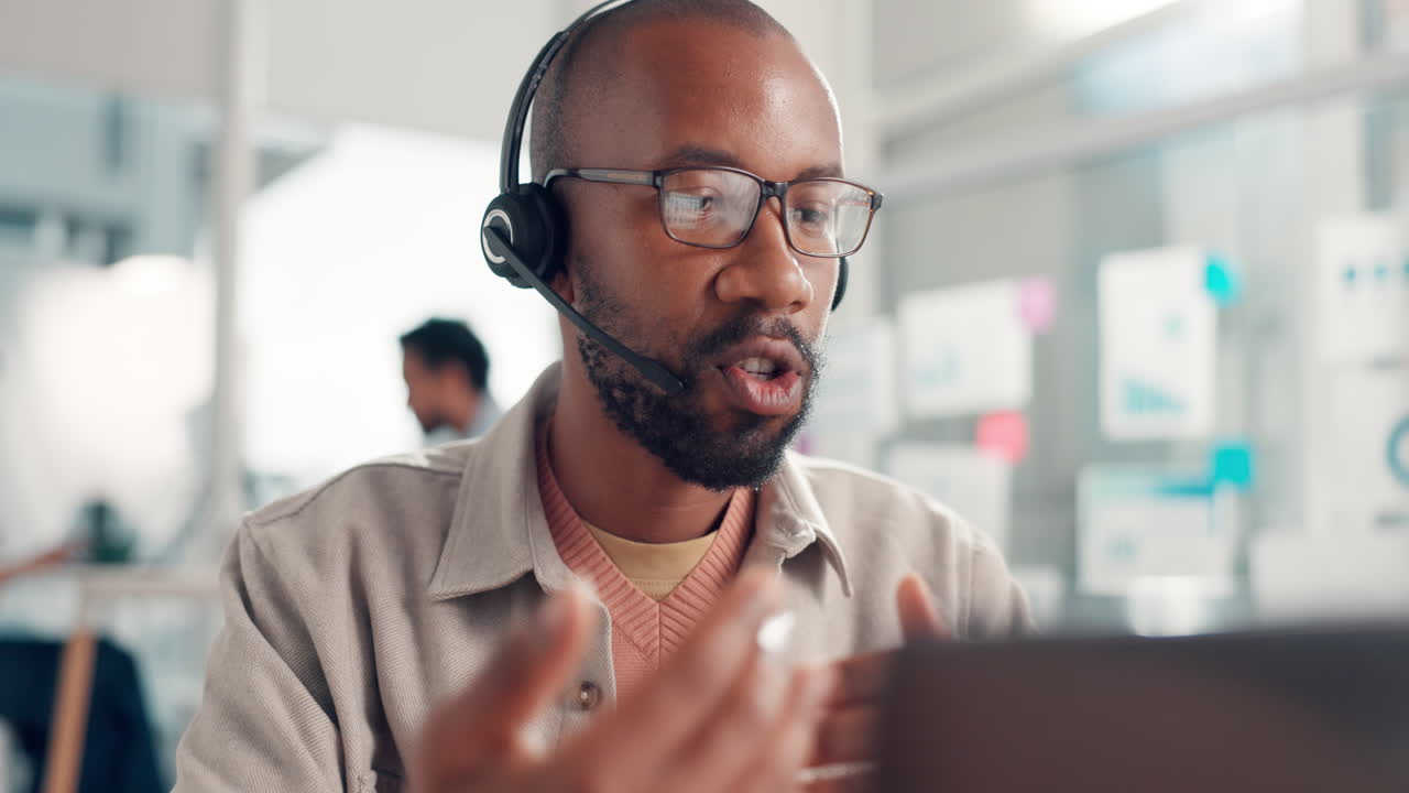 Man wearing a headset in an office