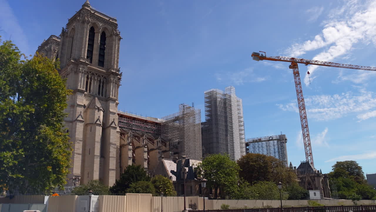 Notre Dame Cathedral in Paris, France near the River Seine under construction after fire damage.