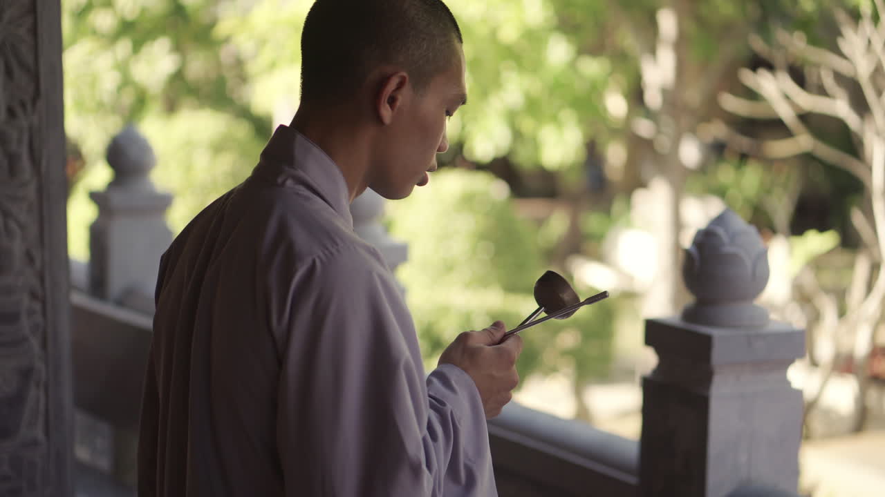 Buddhist Monk Performing Ceremony