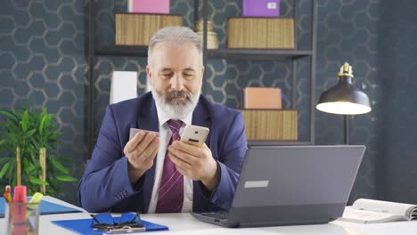 Businessman-shopping-on-the-phone.