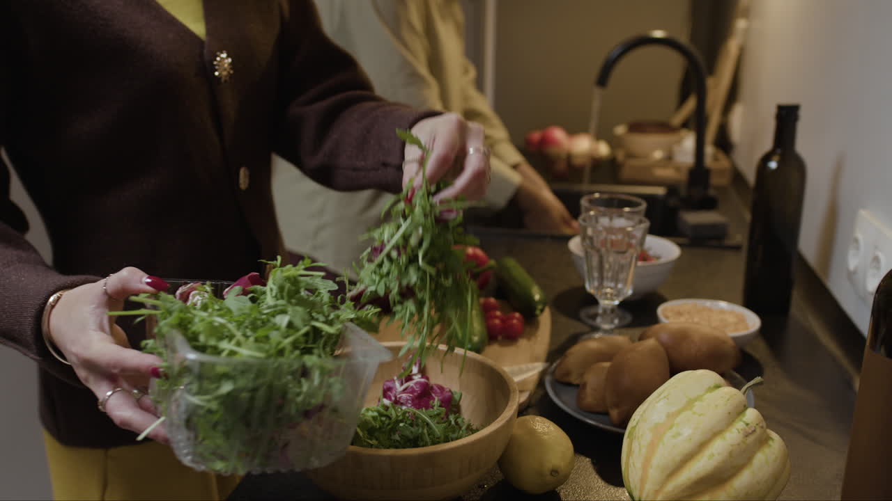 Preparing a Fresh Salad in the Kitchen