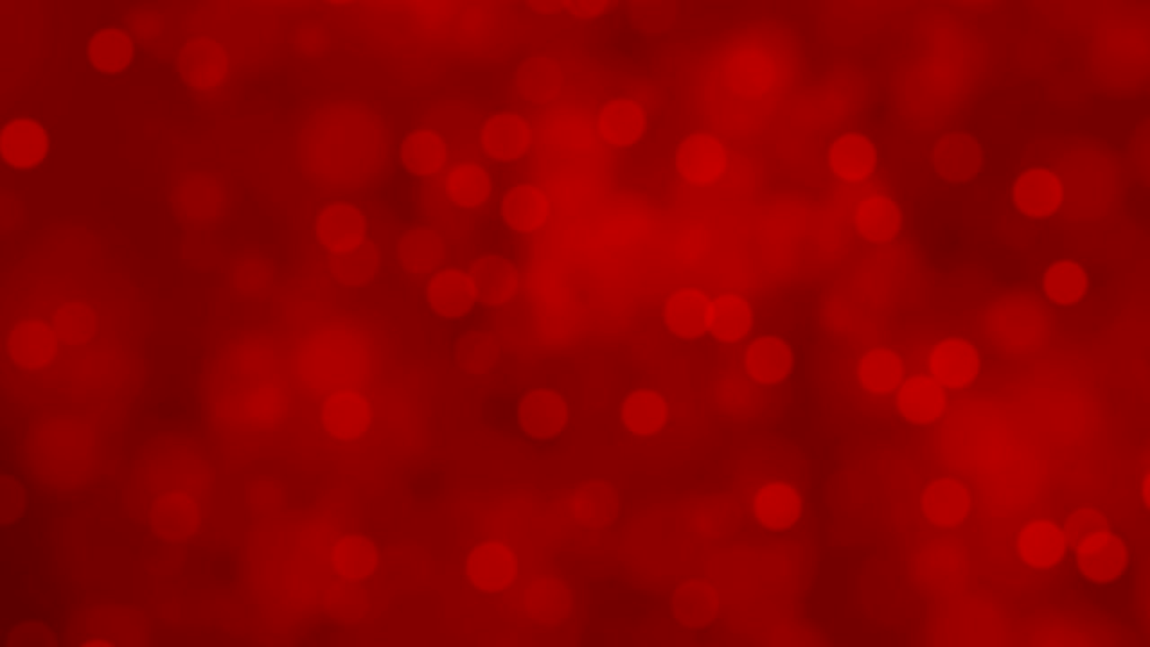 Sfondo natalizio astratto rosso con effetto bokeh