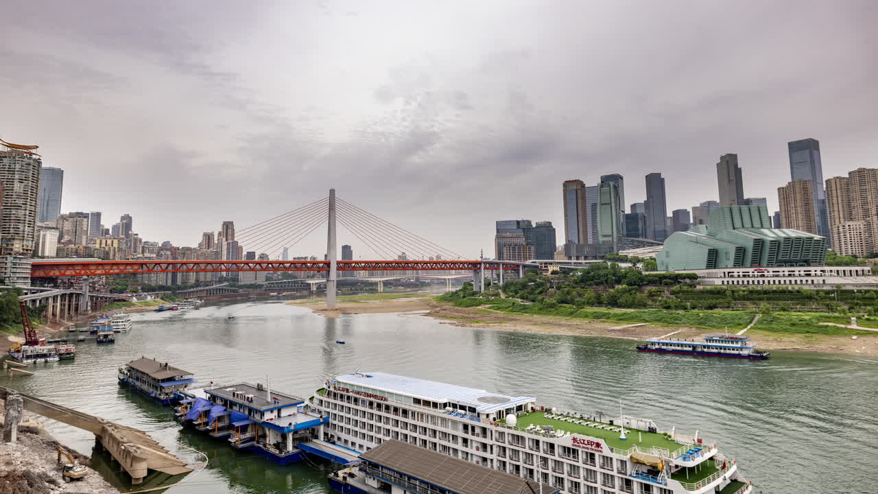 Timelapse of the amazing Chongqing cyberpunk city skyline from a high vantage point with the yangtze river