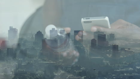 animation of cityscape over african american businessman using smartphone