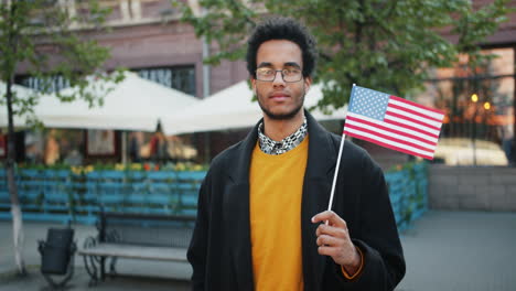 proud man holding american flag