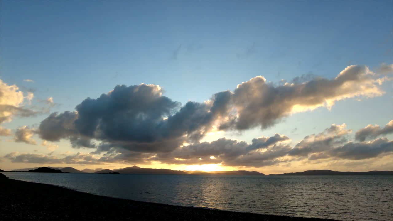 Whitsundays golden hour sunrise motionlapse over the ocean, QLD, Australia