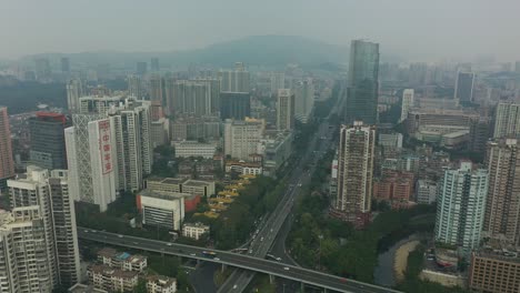 cloudy day guangzhou city center traffic street road junction aerial panorama 4k china