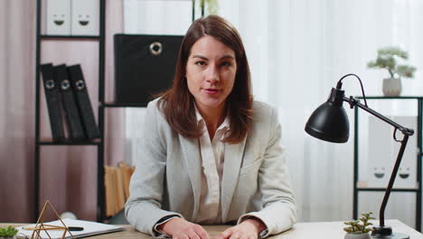 POV-of-business-woman-sits-at-home-office-desk-talking-employee-on-online-communication-video-call