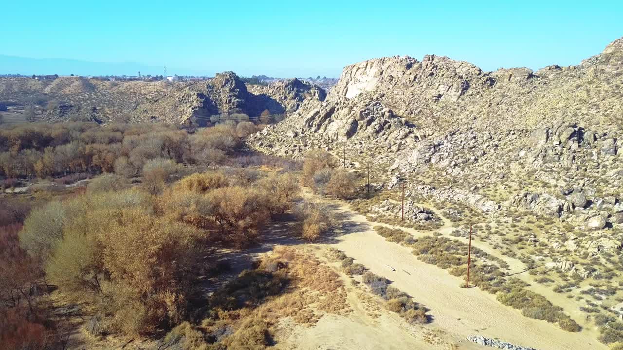 Aerial footage panning dowards of the deserts in California