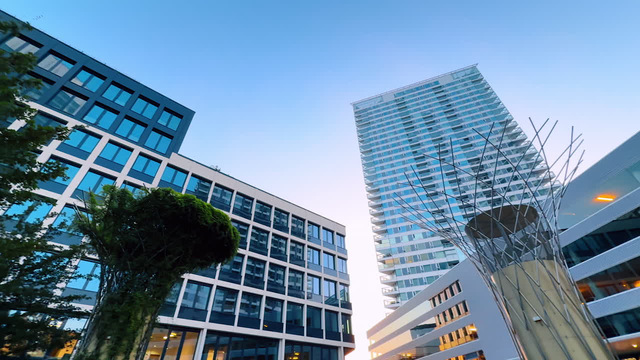 Bratislava, Slovakia, 2 June 2025: High-rises of apartment and office buildings. Low angle view at the modern architecture of Bratislava, Slovakia