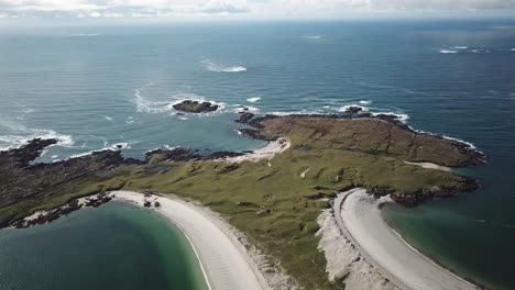 aerial view of an irish landscape, connemara: sandy beach, green meadows and atlantic ocean