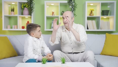 grandfather and grandson holding hands.