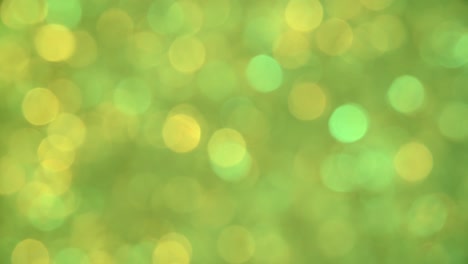 Abstract background of green bokeh spinning