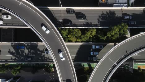 network of overpasses along the brisbane river connecting roadways to the brisbane city and surrounding areas. aerial view
