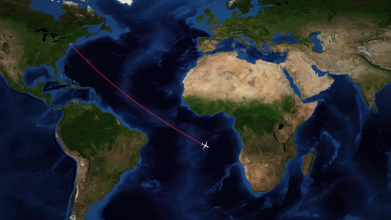 A red line tracks an airplane flying across the Atlantic Ocean on a world map