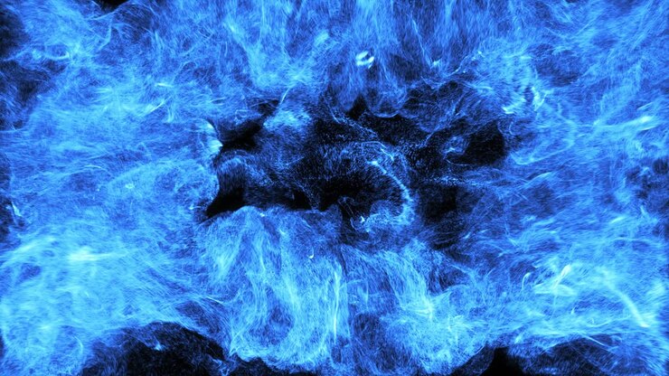 Dinamica esplosione di energia blu in espansione su sfondo nero