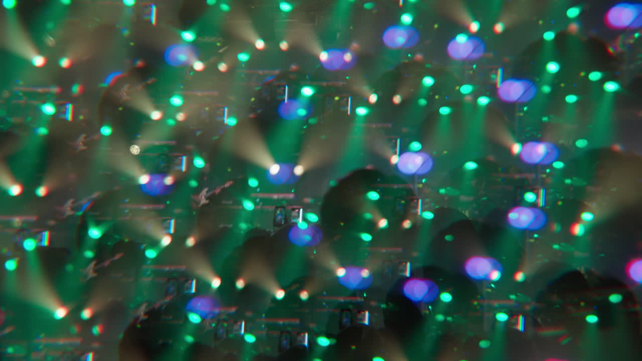 Abstract Moving Green and Blue Stage Lights with Bokeh Effect