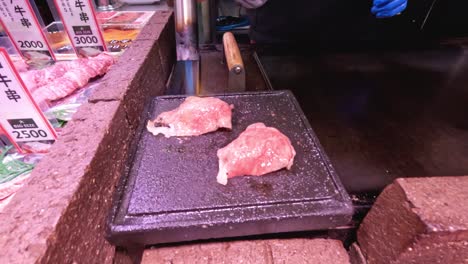 blowtorch used to cook meat on grill