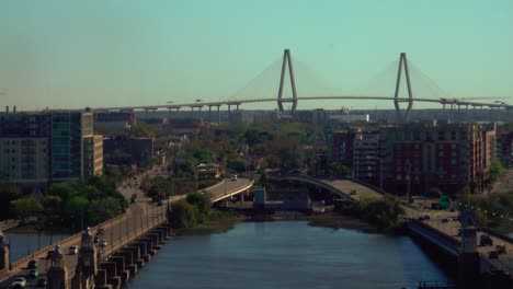 zoom in aerial of charleston south carolina and arthur ravenel bridge